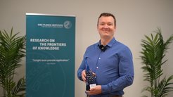 Marcel Böhme receiving the Outstanding Computing Alumni Award